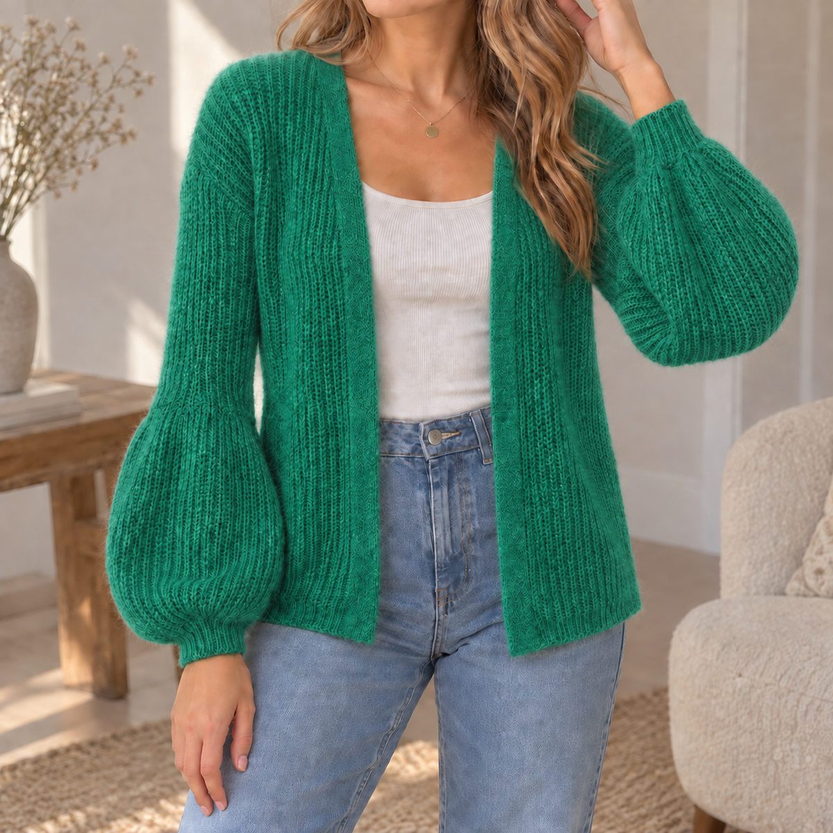 Groen wollen vest met pofmouwen bij Charlis