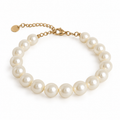 Parelarmband met grote off-white parels, goudkleurige sluiting en verlengketting.